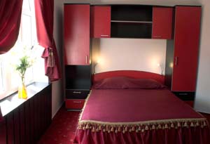 Comfort single with city view, balcony, and private facilities (shower)